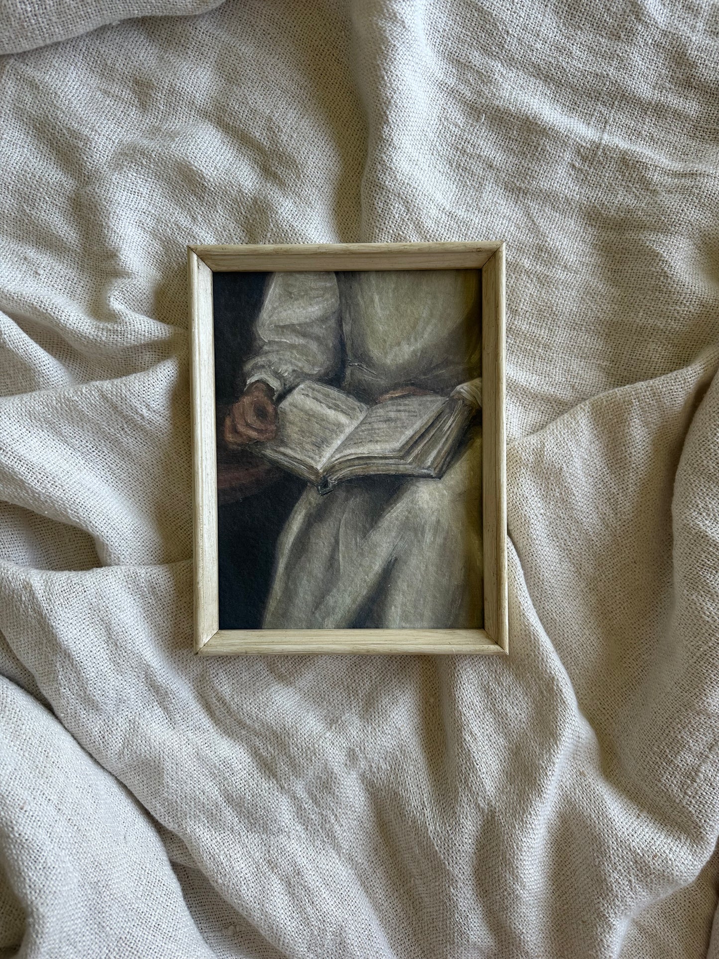 Eli est en Train de Lire Framed Print