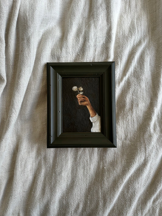 A flower in hand